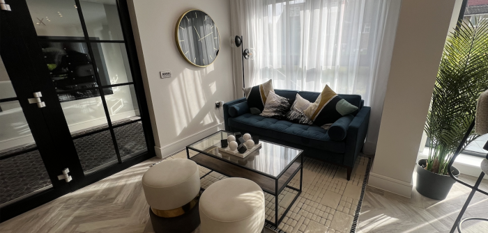 The living area is open plan to the kitchen